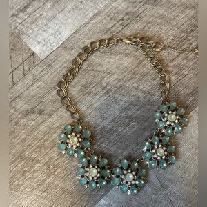 Gold tone necklace w aqua and clear stone flower detail, multiple length option